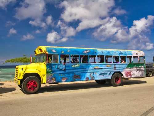 Caribbean - Aruba - Colorful Excursion Bus on the Beach