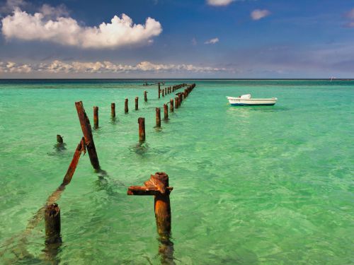 Aruba - Rodger's Beach with broken footbridge and boat