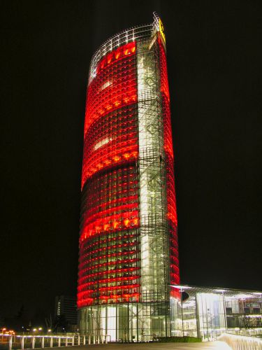 Germany - Bonn - Red illuminated business building