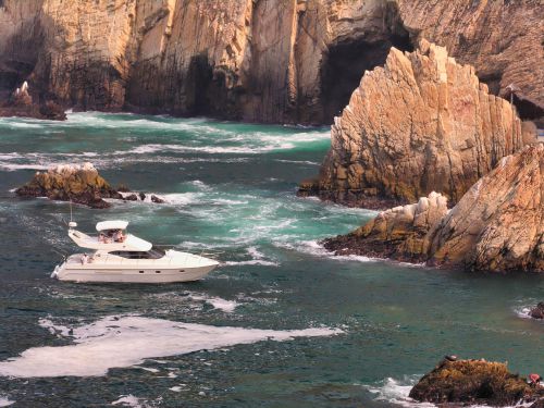 Mexico - Acapulco - Pacific Coastline with Motor Yacht